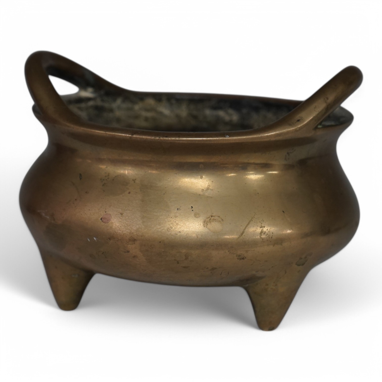 A Chinese bronze tripod censer, archaic Xuande seal mark, 19th century, 11cm. Condition - good